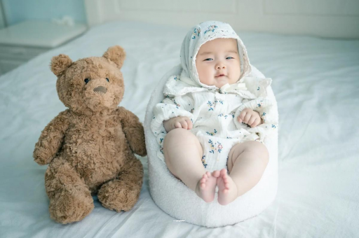 百色宝宝吐奶是什么原因